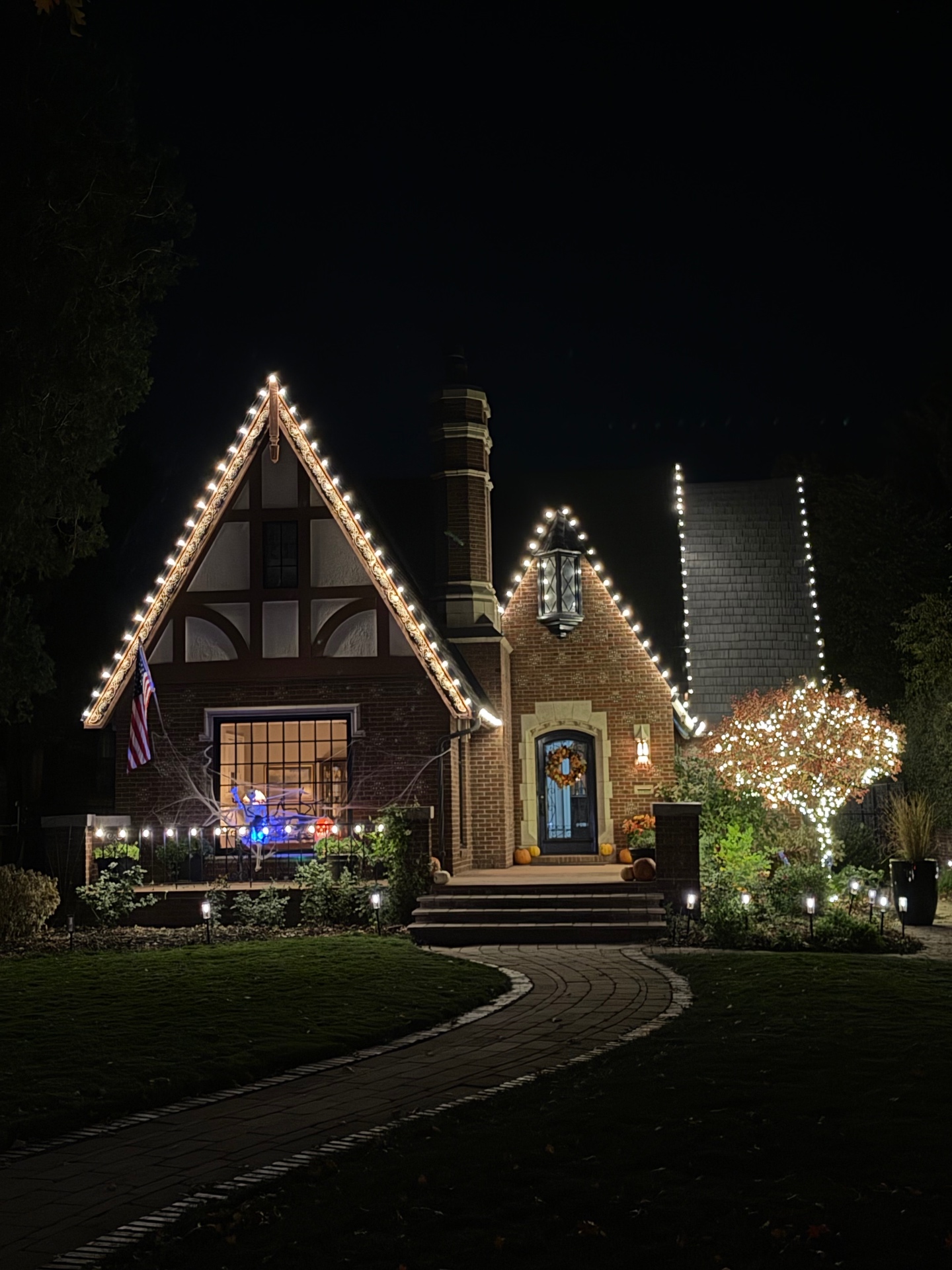 Beautiful Christmas light installation on Tudor-style home in Colorado Springs
